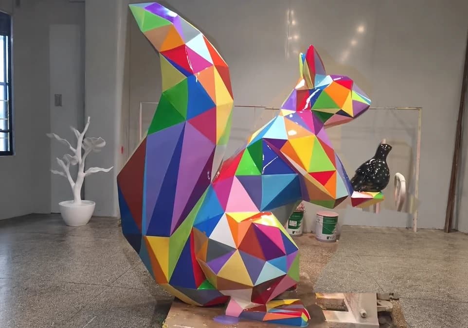 Multicolored faceted squirrel sculpture in the YAVIS workshop